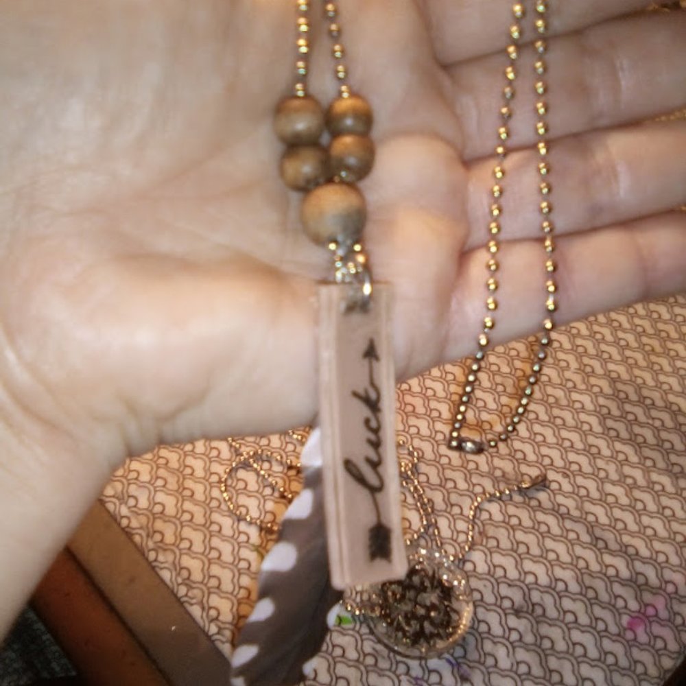 4/ $20 "luck" with feather boho